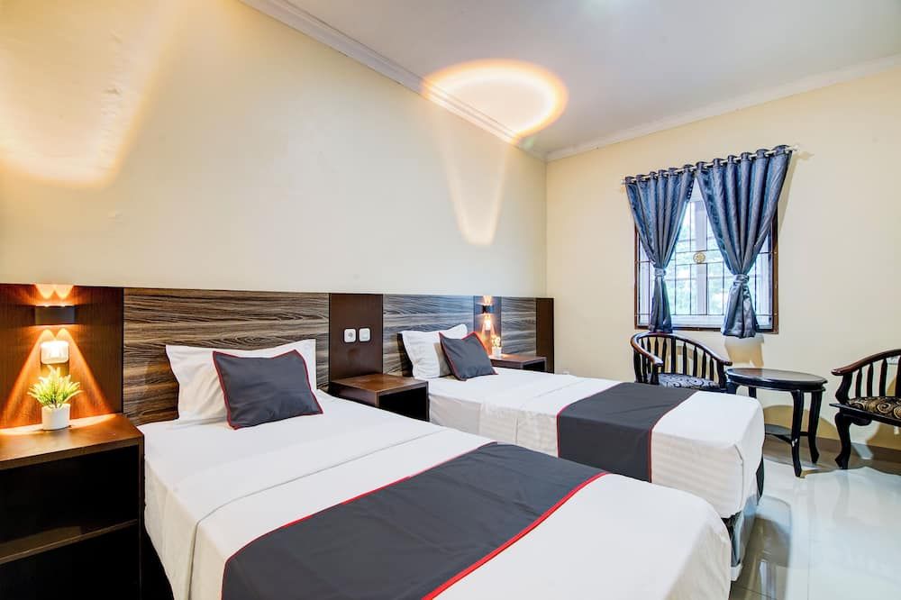 Collection O Kings Homestay - פקאנבארו - חדר שינה