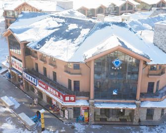 Deli Holiday Hotel - Baishan - Edificio
