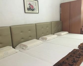 Lai Ming Hotel Cosmoland - Singapur - Habitación