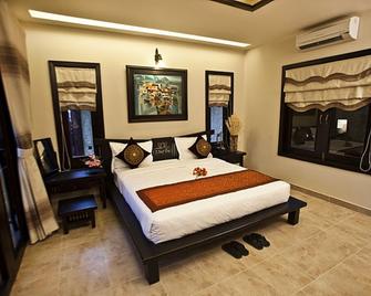 Lotus Village Resort - Phan Thiet - Schlafzimmer