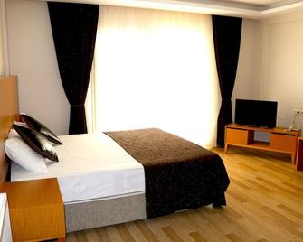 Gumus Thermal Suites Hotel - Davutlar - Habitación
