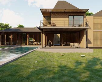 amã Stays & Trails Banjaar Kothi Kanha - Kanha - Budova