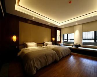 Putuoshan Ruyige Junlan Guest House - Zhoushan - Habitación