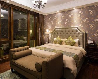 Mu Lan Boutique Inn - Xiangxi - Bedroom