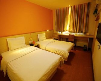 7 Days Inn Xichang Hangtian Avenue Jixiang Road Branch - Liangshan - Schlafzimmer