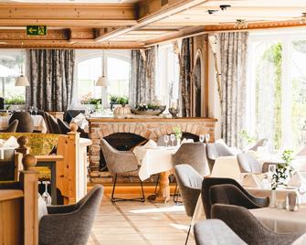 Traumhotel Alpina Superior Adults only Hotel - גרלוס - מסעדה