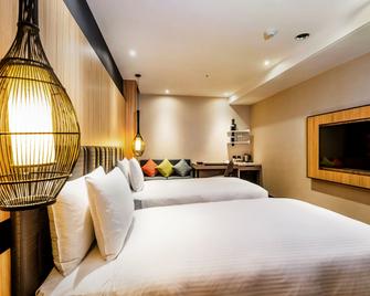 La Vida Hotel - טאיצ'ונג - חדר שינה