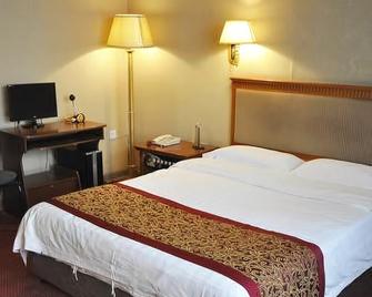 Longyun Hotel (Harbin Railway Station Square) - Harbin - Bedroom