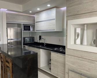 Apartment 50m from the beach - book directly with me - IG pabloreidoimovel - Capão da Canoa - Cocina