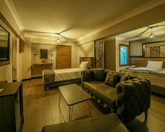 Fidanoglu Suite Hotel - Kesan - Camera da letto