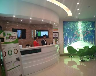 Vatica Qingdao Licang Area Xiazhuang Road Harmonious Square Hotel - צ'ינגדאו - דלפק קבלה