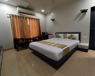 OYO 4155 Hotel The Sudesh - Raipur - Camera da letto