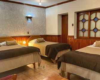 Hotel Escorial - לה סרנה - חדר שינה