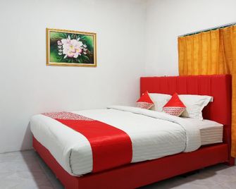 OYO 2611 Hotel Krui Syariah - Krui - Habitación