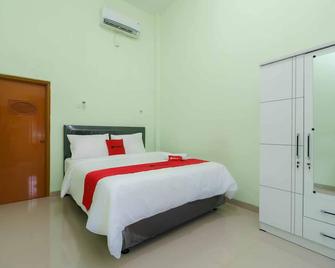 RedDoorz Syariah Near Rsud Dr Hm Rabain - Muara Enim - Habitación