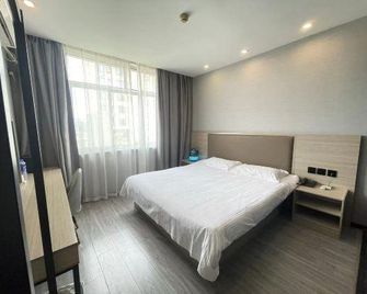 Elan Hotel (Nanjing Xiaozhuang Plaza) - Nanjing - Bedroom