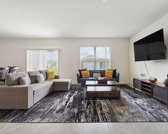 Brand New 4-Bedroom House near Disney & Beaches! - Port St. Lucie - Living room