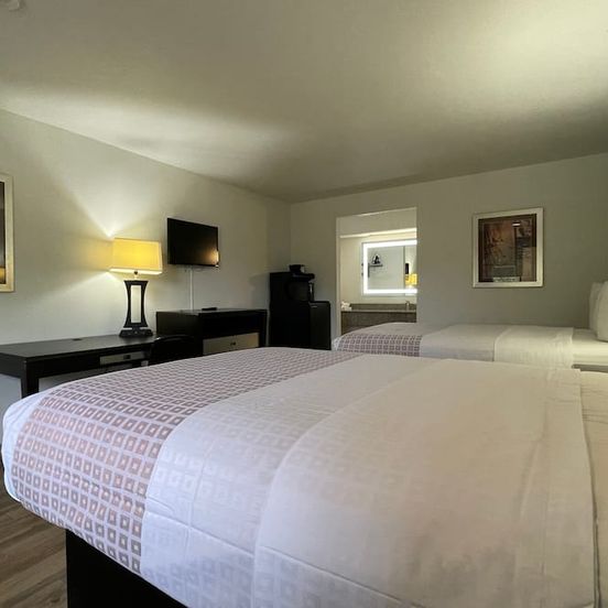 Bedroom view of Tricove Inn & Suites