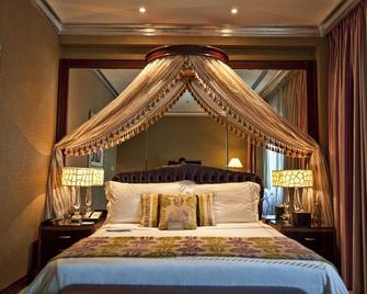 Grand Regency Doha, Trademark Collection - דוחה - חדר שינה