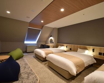 Biei Shirogane Onsen Hotel Park Hills - Biei - Bedroom
