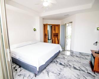 Charming 2-bedroom condo with WiFi, AC in marvelous Lake Arenal. - Tilarán - Sypialnia