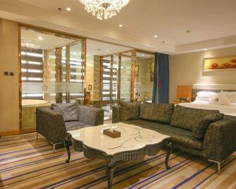 Blossoming Quality Hotel - Si-ning - Obývací pokoj