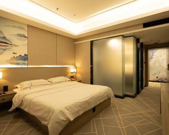 Caesars International Hotel - Jiamusi - Bedroom