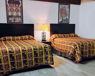 Budget Inn & Suites -Super-Ice Cold and Comfortable & Wonderful rooms plus refrigerator,microwave HBO Max TV & Best Value! - Freer