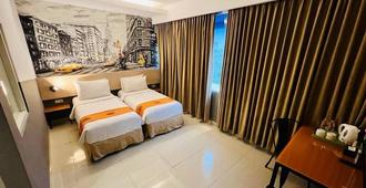 Avirahotel Makassar Panakkukang - Makassar - Phòng ngủ