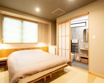Tanuki Luxury Apartments - Nozawa Onsen - Bedroom