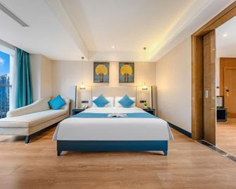 Red Box Exquisite Hotel - Luzhou - Bedroom