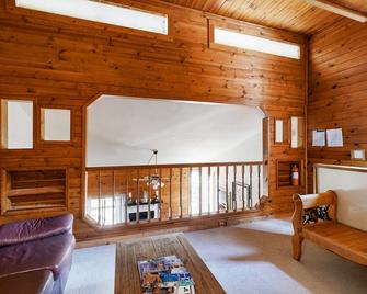 Eclectic second floor condo w/ loft, balcony, & gas fireplace - family friendly - Tahoe Vista - Living room