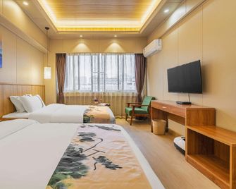 Kunming Quailai Boutique Hotel - Kunming - Makuuhuone