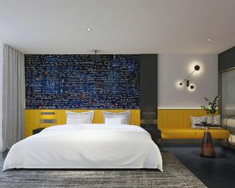 Jianjing Movie Hotel (Xiangtan Baishi Park) - Xiangtan - Bedroom
