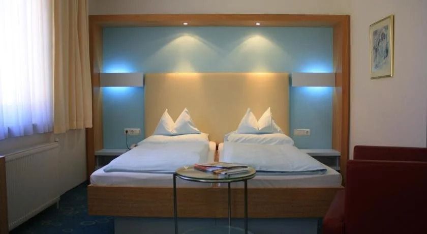 Dom-Hotel - لينز - غرفة نوم