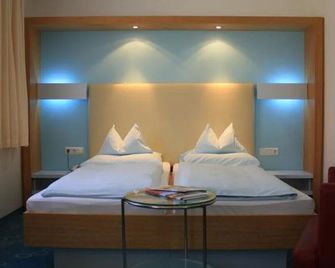 Dom-Hotel - لينز - غرفة نوم