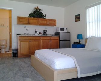 The Bungalows - טרז'ר איילנד - חדר שינה