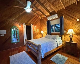 Guava Grove Resort & Villas - Sandy Bay - Bedroom