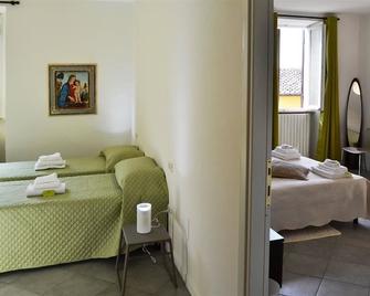 B&B freemocco - Deruta - Schlafzimmer