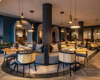 Mövenpick Hotel Windhoek - ווינדהוק - מסעדה