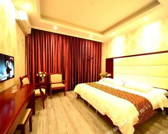 Xianyuan Hotel - Leshan - Slaapkamer