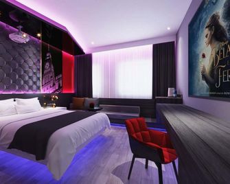 Orange International Hotel (Anqing 7th Street) - Anqing - Schlafzimmer
