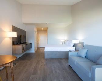 Sand Pebbles Inn - Qualicum Beach - Makuuhuone