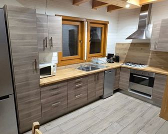 Chalet for 16 people with an independent games room - Les Orres - Cuisine