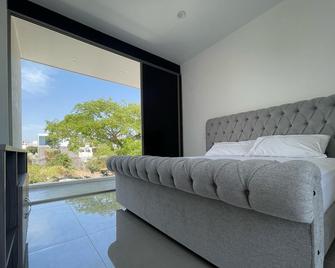 Casa del Río - Residencia de Lujo con pisicina grande y cascada - Colima - Habitación