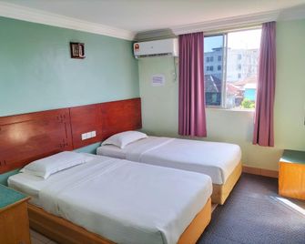 Faber Inn - Bintulu - Slaapkamer