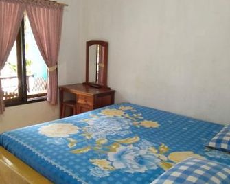 Riswan Guest House - Bira - Sypialnia