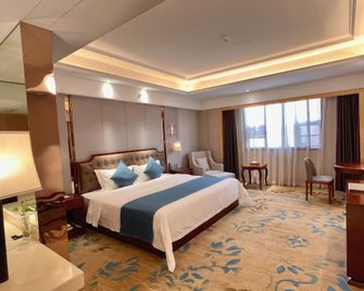 Yongzheng International Hotel - Suining - Schlafzimmer