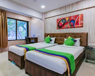 Treebo Lake Bloom Powai - Mumbai - Bedroom