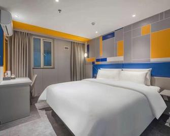 7Days Inn Shaoguan Jie Fang Road Perestrian Shopping Street - Shaoguan - Camera da letto